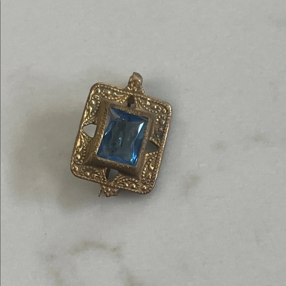 Elegant Gold and Blue Brooch